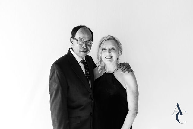 Couple posing together at a black tie gala