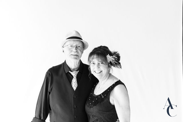 Guests in vintage hats posing side by side