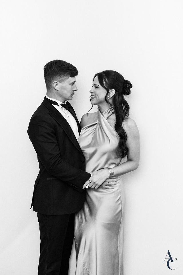 Couple face to face in a candid reception portrait